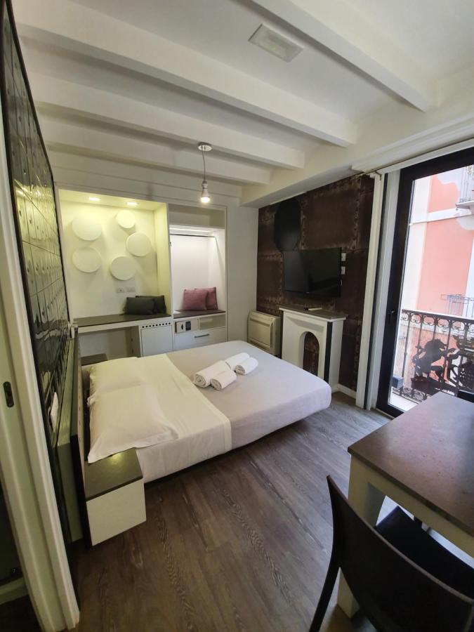 Emphasis Suites & Rooms Кальяри Экстерьер фото